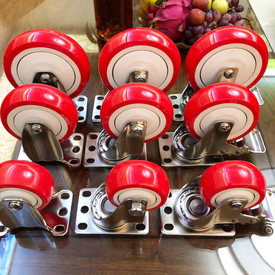 Eslabón giratorio rojo para trabajos de tipo medio de la PU de 5 pulgadas que cierra los echadores de acero inoxidables con los guardapolvos